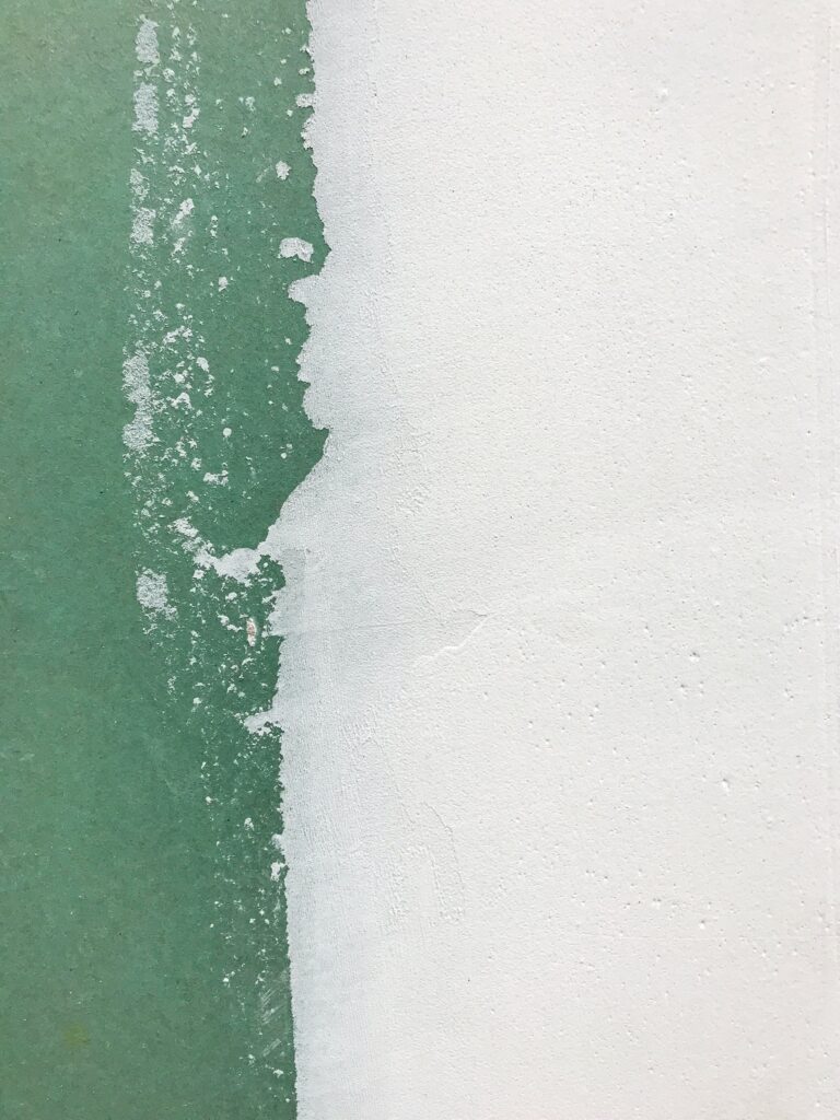 green paint wash on wall